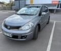 Серый Ниссан Тиида, объемом двигателя 1.6 л и пробегом 95 тыс. км за 7599 $, фото 1 на Automoto.ua