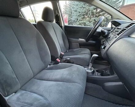 Серый Ниссан Тиида, объемом двигателя 1.8 л и пробегом 204 тыс. км за 6500 $, фото 19 на Automoto.ua