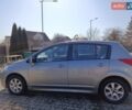 Сірий Ніссан Тііда, об'ємом двигуна 1.6 л та пробігом 114 тис. км за 7900 $, фото 1 на Automoto.ua