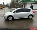 Серый Ниссан Тиида, объемом двигателя 1.6 л и пробегом 165 тыс. км за 6800 $, фото 1 на Automoto.ua