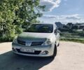 Серый Ниссан Тиида, объемом двигателя 1.5 л и пробегом 82 тыс. км за 7300 $, фото 1 на Automoto.ua