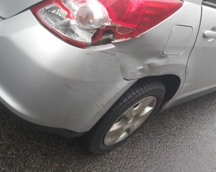 Серый Ниссан Тиида, объемом двигателя 1.5 л и пробегом 50 тыс. км за 5000 $, фото 4 на Automoto.ua