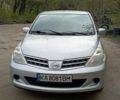 Серый Ниссан Тиида, объемом двигателя 1.5 л и пробегом 62 тыс. км за 8765 $, фото 1 на Automoto.ua