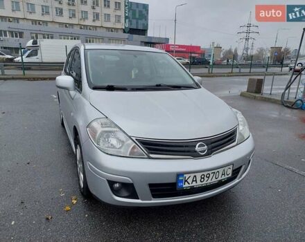 Серый Ниссан Тиида, объемом двигателя 1.6 л и пробегом 195 тыс. км за 7300 $, фото 1 на Automoto.ua