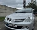 Серый Ниссан Тиида, объемом двигателя 1.5 л и пробегом 145 тыс. км за 7800 $, фото 1 на Automoto.ua