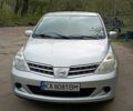 Серый Ниссан Тиида, объемом двигателя 1.5 л и пробегом 62 тыс. км за 8599 $, фото 1 на Automoto.ua