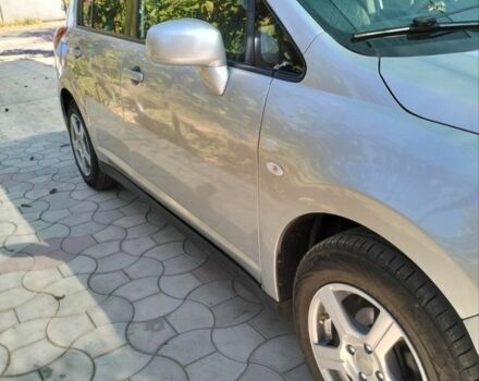 Сірий Ніссан Тііда, об'ємом двигуна 1.5 л та пробігом 150 тис. км за 7800 $, фото 1 на Automoto.ua