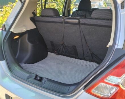 Сірий Ніссан Тііда, об'ємом двигуна 1.5 л та пробігом 150 тис. км за 7800 $, фото 11 на Automoto.ua