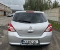 Серый Ниссан Тиида, объемом двигателя 1.5 л и пробегом 145 тыс. км за 7800 $, фото 4 на Automoto.ua