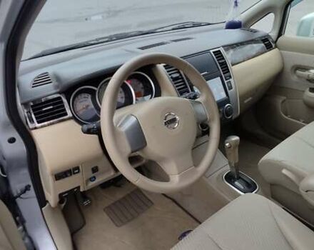 Серый Ниссан Тиида, объемом двигателя 1.6 л и пробегом 113 тыс. км за 6996 $, фото 10 на Automoto.ua