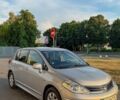 Серый Ниссан Тиида, объемом двигателя 1.6 л и пробегом 125 тыс. км за 8200 $, фото 1 на Automoto.ua
