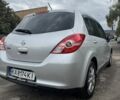 Серый Ниссан Тиида, объемом двигателя 1.5 л и пробегом 145 тыс. км за 7800 $, фото 3 на Automoto.ua