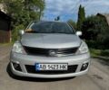 Серый Ниссан Тиида, объемом двигателя 1.6 л и пробегом 214 тыс. км за 7300 $, фото 1 на Automoto.ua