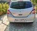 Сірий Ніссан Тііда, об'ємом двигуна 1.5 л та пробігом 150 тис. км за 7800 $, фото 3 на Automoto.ua