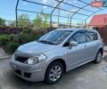 Серый Ниссан Тиида, объемом двигателя 1.6 л и пробегом 115 тыс. км за 8200 $, фото 1 на Automoto.ua