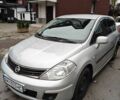 Сірий Ніссан Тііда, об'ємом двигуна 1.6 л та пробігом 230 тис. км за 7513 $, фото 1 на Automoto.ua