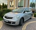 Сірий Ніссан Тііда, об'ємом двигуна 1.6 л та пробігом 153 тис. км за 7900 $, фото 1 на Automoto.ua
