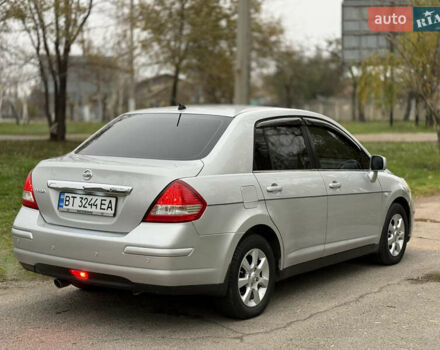 Серый Ниссан Тиида, объемом двигателя 1.6 л и пробегом 199 тыс. км за 5800 $, фото 4 на Automoto.ua