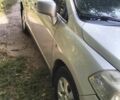 Серый Ниссан Тиида, объемом двигателя 1.8 л и пробегом 255 тыс. км за 4750 $, фото 2 на Automoto.ua