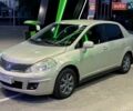 Серый Ниссан Тиида, объемом двигателя 1.6 л и пробегом 320 тыс. км за 3900 $, фото 1 на Automoto.ua