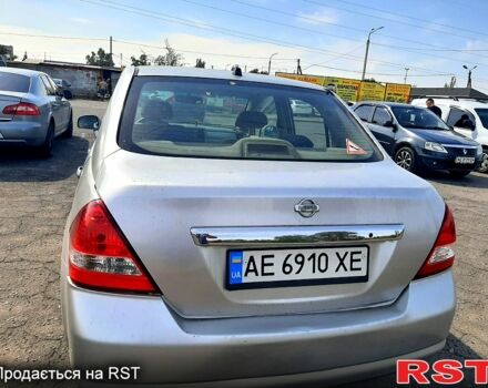 Сірий Ніссан Тііда, об'ємом двигуна 1.6 л та пробігом 300 тис. км за 4400 $, фото 2 на Automoto.ua