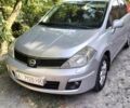 Серый Ниссан Тиида, объемом двигателя 1.8 л и пробегом 255 тыс. км за 4750 $, фото 1 на Automoto.ua