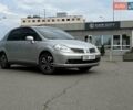 Серый Ниссан Тиида, объемом двигателя 1.6 л и пробегом 271 тыс. км за 4999 $, фото 1 на Automoto.ua