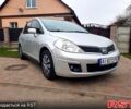 Серый Ниссан Тиида, объемом двигателя 1.6 л и пробегом 285 тыс. км за 3800 $, фото 1 на Automoto.ua