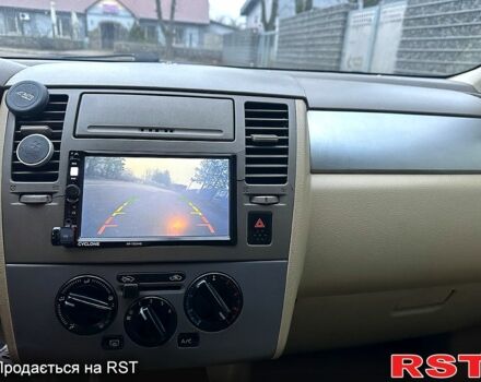 Серый Ниссан Тиида, объемом двигателя 1.6 л и пробегом 256 тыс. км за 4500 $, фото 8 на Automoto.ua