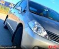 Серый Ниссан Тиида, объемом двигателя 1.6 л и пробегом 176 тыс. км за 5200 $, фото 1 на Automoto.ua