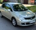 Серый Ниссан Тиида, объемом двигателя 1.6 л и пробегом 300 тыс. км за 3500 $, фото 1 на Automoto.ua
