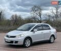 Серый Ниссан Тиида, объемом двигателя 1.8 л и пробегом 255 тыс. км за 4200 $, фото 1 на Automoto.ua