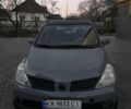 Серый Ниссан Тиида, объемом двигателя 1.6 л и пробегом 281 тыс. км за 4300 $, фото 1 на Automoto.ua