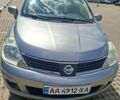 Серый Ниссан Тиида, объемом двигателя 1.6 л и пробегом 179 тыс. км за 5500 $, фото 1 на Automoto.ua