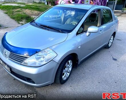 Сірий Ніссан Тііда, об'ємом двигуна 1.6 л та пробігом 200 тис. км за 4950 $, фото 1 на Automoto.ua
