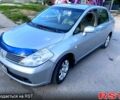 Сірий Ніссан Тііда, об'ємом двигуна 1.6 л та пробігом 200 тис. км за 4950 $, фото 1 на Automoto.ua
