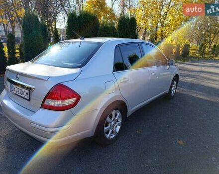 Серый Ниссан Тиида, объемом двигателя 1.8 л и пробегом 165 тыс. км за 5400 $, фото 20 на Automoto.ua