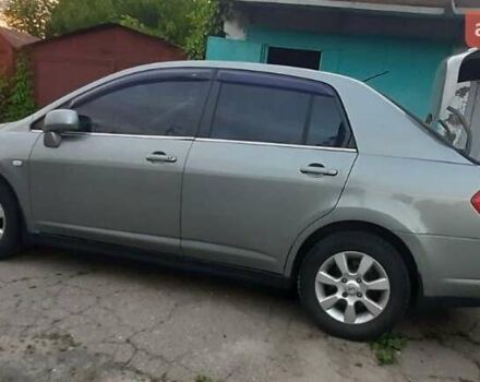 Сірий Ніссан Тііда, об'ємом двигуна 1.8 л та пробігом 199 тис. км за 4740 $, фото 1 на Automoto.ua