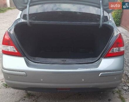 Сірий Ніссан Тііда, об'ємом двигуна 1.8 л та пробігом 199 тис. км за 4740 $, фото 3 на Automoto.ua