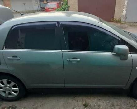 Сірий Ніссан Тііда, об'ємом двигуна 1.8 л та пробігом 199 тис. км за 4740 $, фото 2 на Automoto.ua