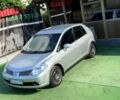 Серый Ниссан Тиида, объемом двигателя 1.6 л и пробегом 100 тыс. км за 6550 $, фото 1 на Automoto.ua