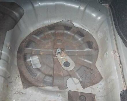 Сірий Ніссан Тііда, об'ємом двигуна 1.8 л та пробігом 199 тис. км за 4740 $, фото 5 на Automoto.ua