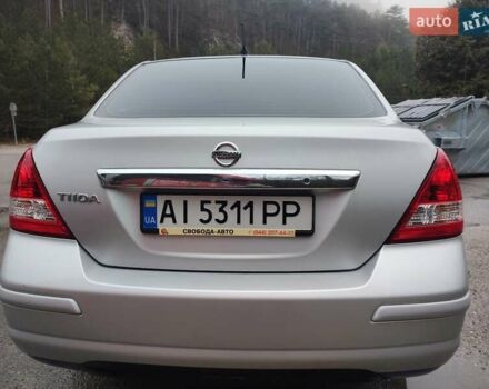 Сірий Ніссан Тііда, об'ємом двигуна 1.6 л та пробігом 45 тис. км за 8700 $, фото 4 на Automoto.ua