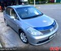 Сірий Ніссан Тііда, об'ємом двигуна 1.6 л та пробігом 200 тис. км за 4950 $, фото 1 на Automoto.ua