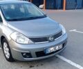 Серый Ниссан Тиида, объемом двигателя 1.6 л и пробегом 211 тыс. км за 7200 $, фото 1 на Automoto.ua