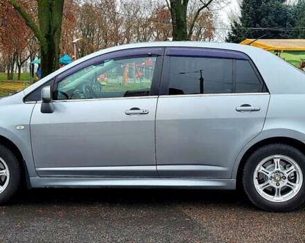 Серый Ниссан Тиида, объемом двигателя 1.6 л и пробегом 199 тыс. км за 5390 $, фото 4 на Automoto.ua