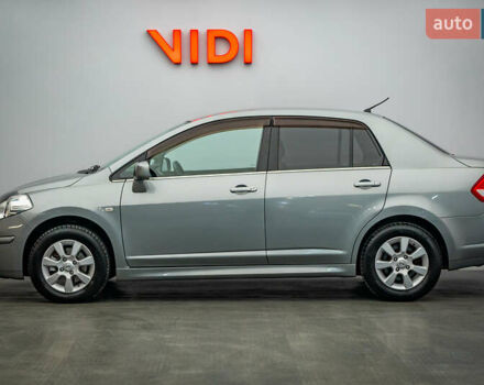 Серый Ниссан Тиида, объемом двигателя 1.6 л и пробегом 166 тыс. км за 6997 $, фото 2 на Automoto.ua