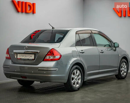 Серый Ниссан Тиида, объемом двигателя 1.6 л и пробегом 166 тыс. км за 6997 $, фото 1 на Automoto.ua
