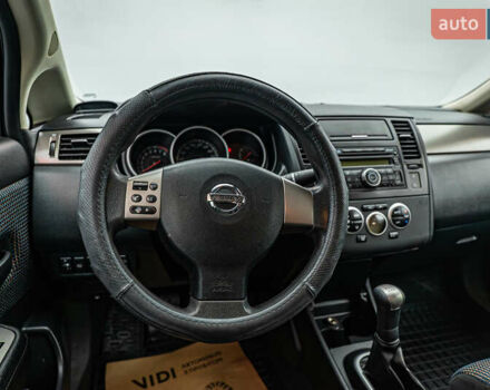 Серый Ниссан Тиида, объемом двигателя 1.6 л и пробегом 166 тыс. км за 6997 $, фото 11 на Automoto.ua