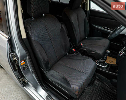 Серый Ниссан Тиида, объемом двигателя 1.6 л и пробегом 166 тыс. км за 6997 $, фото 18 на Automoto.ua